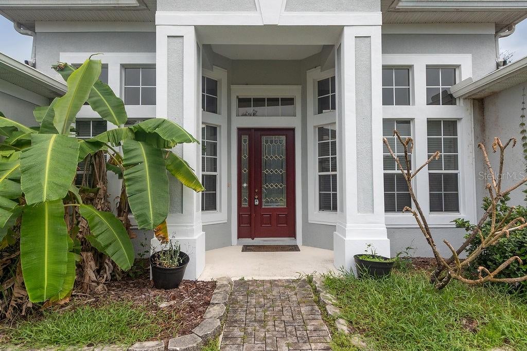 Photo of 421 Holly Fern Trail, Deland, FL 32720 (MLS # V4951183)