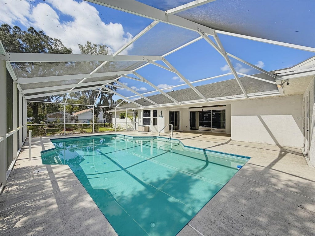 Photo of 10074 Sleepy Willow Court, Spring Hill, FL 34608 (MLS # W7890461)