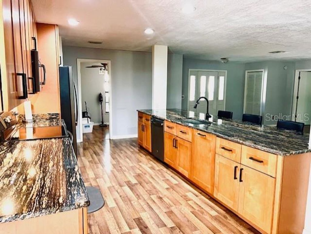 Photo of 3110 S Eagle Terrace, Inverness, FL 34450 (MLS # O6378948)