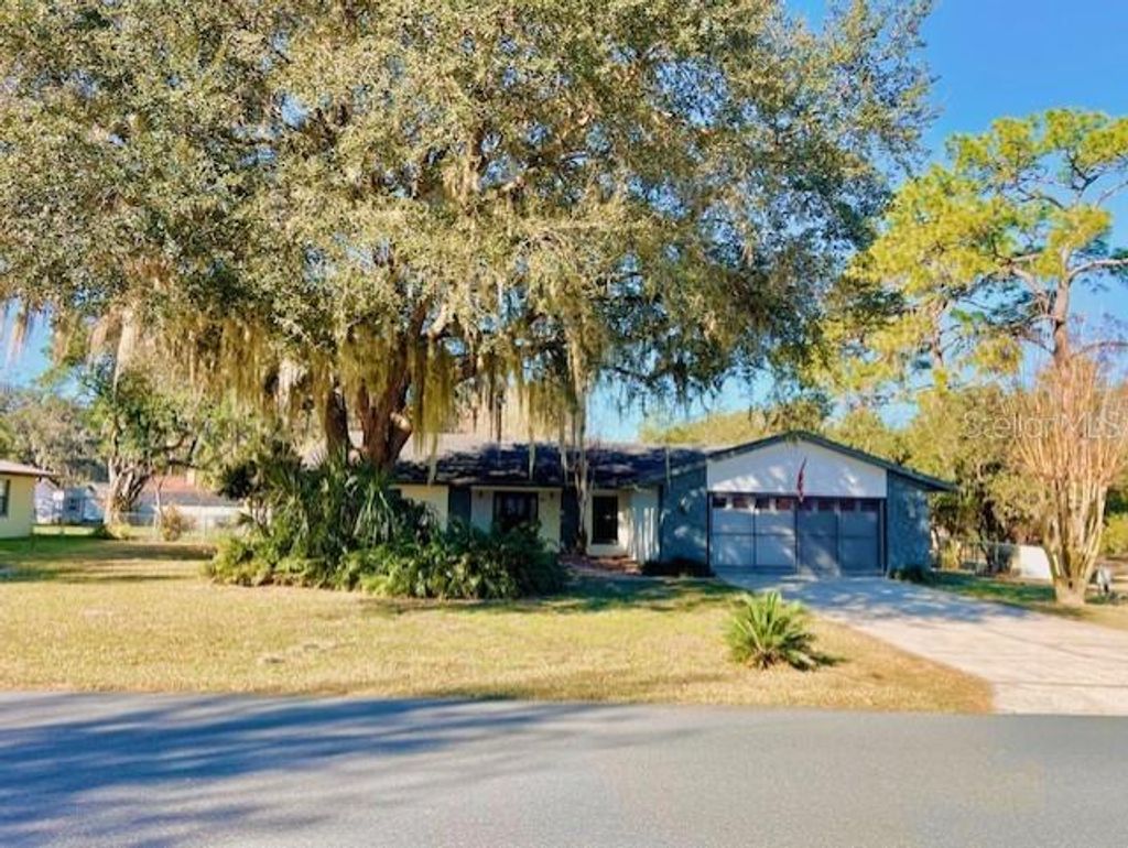 Photo of 3110 S Eagle Terrace, Inverness, FL 34450 (MLS # O6378948)