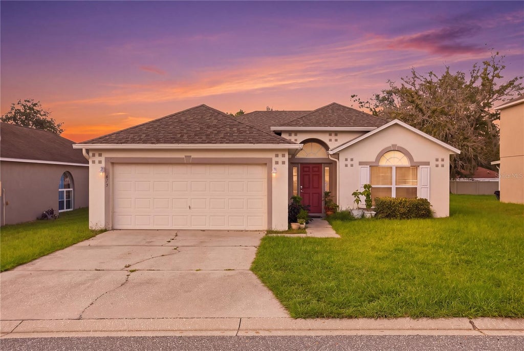 Photo of 673 Lobelia Drive, Davenport, FL 33837 (MLS # O6445817)