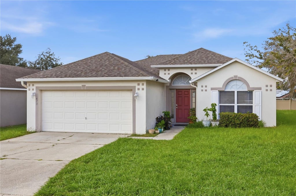 Photo of 673 Lobelia Drive, Davenport, FL 33837 (MLS # O6445817)