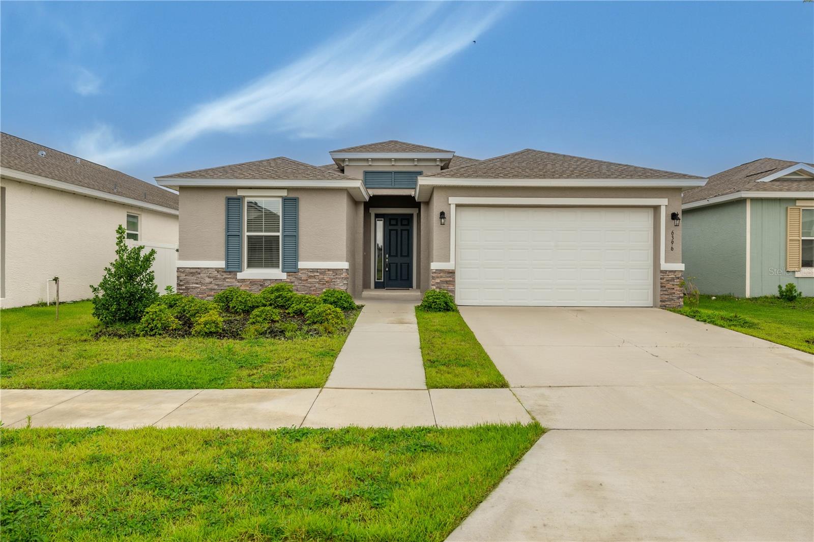 Discover this beautifully upgraded 3-bedroom, 2-bath Amber Model located in the desirable gated community of Calesa Township. With a low monthly HOA of just $131 that includes trash pickup, this home offers incredible value and comfort. Interior upgrades include French doors leading to a covered lanai, tray ceilings in both the great room and primary bedroom with recessed LED lighting and prewiring for ceiling fans, a living room floor outlet, whole-house blinds, and pre-plumbing in the garage for a future utility sink. The kitchen features upgraded granite or quartz countertops, enhanced cabinetry, and stainless steel appliances, along with coordinated fixtures and accessories throughout the bathrooms. Calesa Township offers an impressive lineup of amenities including a resort-style pool with sun shelf, splash pad, shaded cabanas, playground, full basketball court, two multipurpose lawns, a walking path loop with seating, and miles of both paved and natural trails. A dedicated dog park is available for pet owners, and families will appreciate the onsite public K-8 charter school and the community Aquatic Center. Don’t miss your chance to tour this stunning home and experience the lifestyle Calesa Township has to offer.