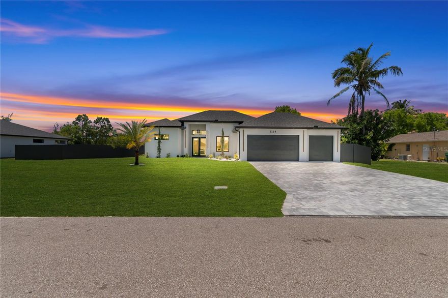 One or more photos have been virtually staged, AI generated, or rendered. This new construction waterfront home is thoughtfully designed to combine comfort, style, and functionality in a peaceful Florida setting. Situated on an oversized lot with city water and sewer, the residence offers privacy, spacious living, and modern finishes throughout. The open-concept layout is centered around a chef-inspired kitchen featuring a large island, quartz countertops, and elegant architectural details, while expansive living spaces are filled with natural light and create a seamless indoor-outdoor flow. Step outside to enjoy a resort-style pavered pool, outdoor kitchen, and tranquil freshwater canal views perfect for kayaking, paddleboarding, or relaxing evenings by the water. The split-bedroom floor plan includes a dedicated pool bath and a versatile fourth bedroom ideal for guests, a home office, or flex space. Additional highlights include a spacious three-car garage, modern lighting, heated floors in the primary bathroom, and quality construction designed for both everyday living and entertaining. Additional locations available.