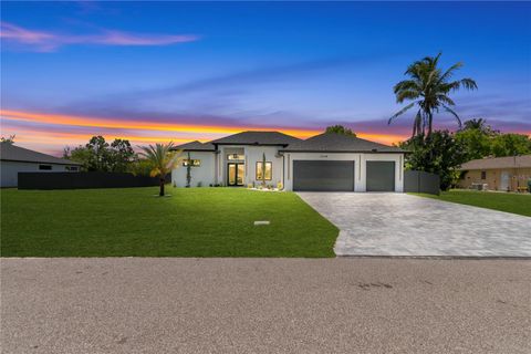 Photo of 1114 SW 8th Pl, Cape Coral, FL 33991 (MLS # TB8505757)
