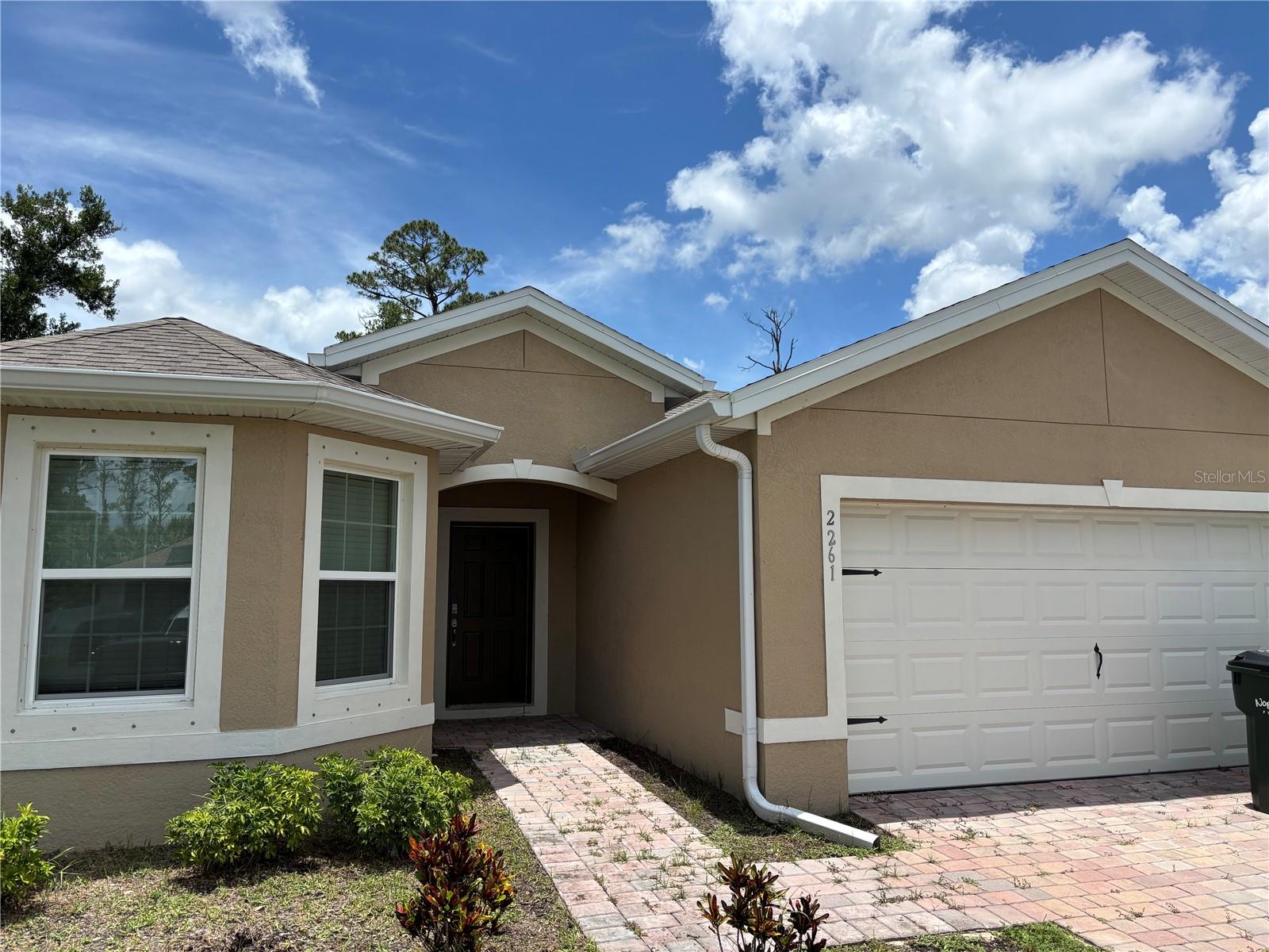 Come see this newly constructed home in North Port near Atwater Elementary. This beautiful home has walk in closets, tile floors throughout the common area, carpeted bedroom and inside utility room with washer & dryer hookups. There is also a spacious two car garage for parking vehicles or storing your extra things. The kitchen with stainless appliances will bring out the chef in you and a great breakfast nook is incorporated into the kitchen for a great dining experience. The home is situated next to a conservation area for that extra privacy allowing you to relax at the end of a long day.