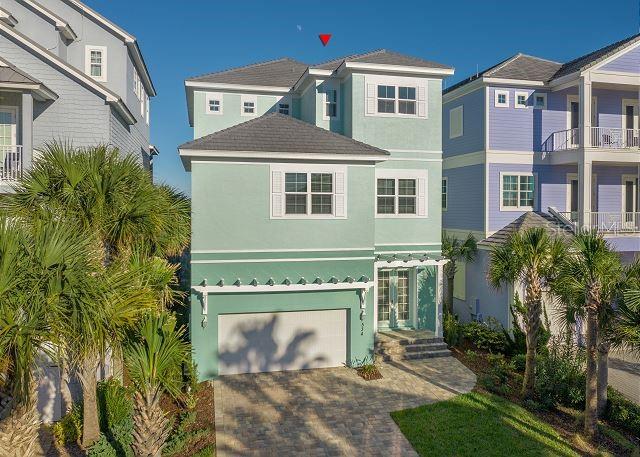 Spectacular oceanfront home in Cinnamon Beach! "Sea Glass" is a stunning 6 bedroom/5.5 bathroom residence offering breathtaking views of the Atlantic, private pool, and dedicated boardwalk for instant access to the beach. All three luxurious living levels are serviced by interior elevator, so it’s a breeze to go up and down with groceries or luggage. The ground level offers 3 spacious guest bedrooms, an entertainment room for your friends and family to gather, and access to the pool and patio area. Lounge all day in the sun, or use your private walkway (shared with one neighbor) to get your toes in the sand in no time! The second floor is the main living level, and features an open-concept living area outfitted in crisp and cool color tones, dining space with a view, and gourmet kitchen. Mesmerizing ocean views draw you to the massive 35-foot long balcony. This is an ideal spot for the whole family to gather and recharge to the sound of waves crashing in on the shore. The kitchen features a huge island with breakfast bar seating and fabulous prep space. Smell the coffee brewing in the morning, and effortlessly carry it out to the large deck to sip on while you watch the sunrise. Two additional guest suites are conveniently located on this floor as well. Ascend the staircase or the elevator to the 3rd floor, where you’ll find the master suite of your dreams, which runs the full width of the house on the ocean. Wake each morning to the sun coming up over the Atlantic. Open up the sliders to your massive balcony and let the sounds of the sea rock you to sleep each night. Giant walk-in shower and soaking tub. Cozy up in the sitting area with two-sided electric fireplace. You’ll never want to leave your room! Cinnamon Beach is a privately gated neighborhood within the exclusive community of Ocean Hammock, a tranquil, coastal gem located in Palm Coast, Florida, just 20 minutes south of St. Augustine, 30 minutes north of Daytona Beach and 75 minutes east of Orlando. Featuring 2.5 miles of pristine cinnamon-toned beach, the community features a harmonious blend of Key West-styled homes. Community amenities include lakeside clubhouse with “zero-entry” pool for the little ones, water slide, fitness center, game room, bar/grille, lounge, and oceanfront pool complex with hot tub and access to the beach. Sea Glass is offered inclusive of exquisite designer furnishings. Move-in or rental ready! Sensational rental history through Cinnamon Beach Vacations- over $230k in revenue in 2022 alone. This one won’t last- don’t delay!