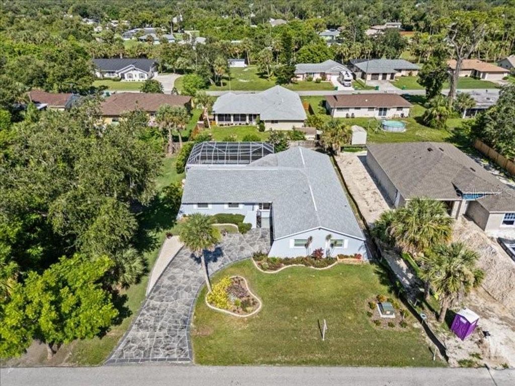 Photo of 1505 Kenmore Street, Port Charlotte, FL 33952 (MLS # C7510100)