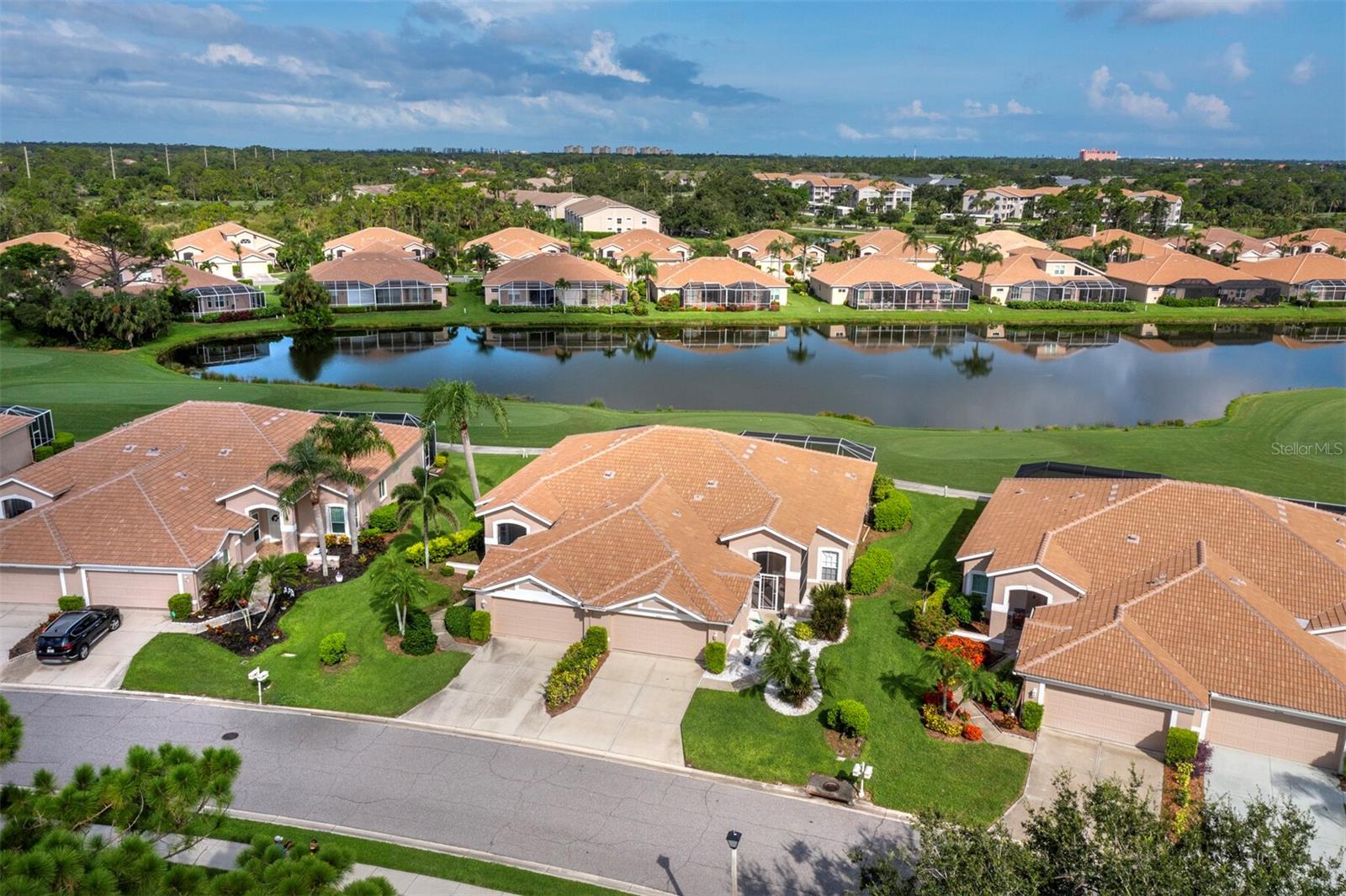 Welcome to this beautifully appointed 2-bedroom, 2-bath, Plus a Den villa with stunning panoramic views of the golf course and a tranquil pond—an ideal setting for elegant, maintenance-free living. Located in the highly desirable Forest Hills section of Stoneybrook at Palmer Ranch, this villa features a spacious split floor plan that offers privacy for guests, with a guest bedroom and full bath. A screened front entry welcomes you inside, where natural light fills the open-concept living and dining areas. The well-equipped kitchen includes ample cabinet space and a pantry. Additional highlights include a full laundry room and a 2-car garage. Step through sliding glass doors to your expansive screened lanai—your own private oasis with a sparkling pool and spa overlooking the lush fairways and peaceful water views. Perfect for morning coffee or evening sunsets. Stoneybrook Golf & Country Club is a premier, member-owned community offering a newly redesigned 18-hole championship golf course (2024), renovated clubhouse, full-service restaurant with indoor/outdoor dining, Har-Tru tennis courts, pickleball, bocce, a fitness center, and a heated pool and spa. Ideally situated between Sarasota and Venice, you're just minutes from the world-famous white sand beaches of Siesta Key and Nokomis, as well as top dining, shopping, and the Legacy Trail. Come experience the natural beauty, vibrant lifestyle, and relaxed elegance of Stoneybrook—this isn’t just a home, it’s a way of life.