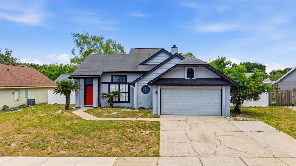 Photo of 6810 Gadwall Lane, Orlando, FL 32810 (MLS # O6409166)
