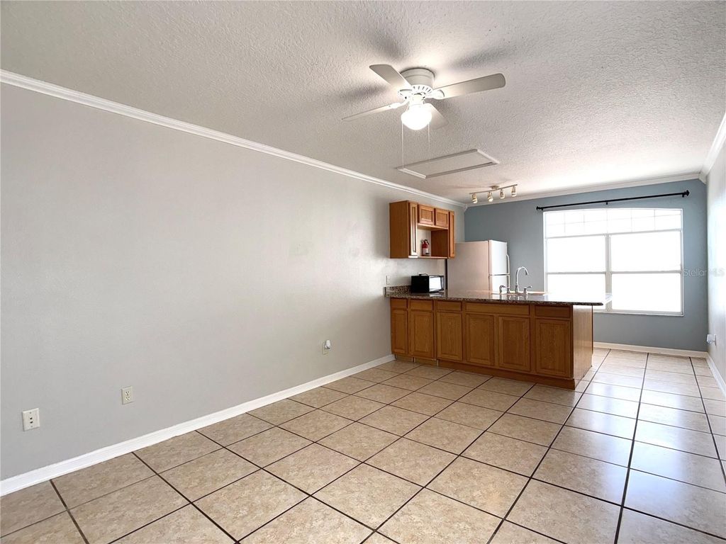 Photo of 133 Mango Drive #Unit A, Davenport, FL 33897 (MLS # O6396565)