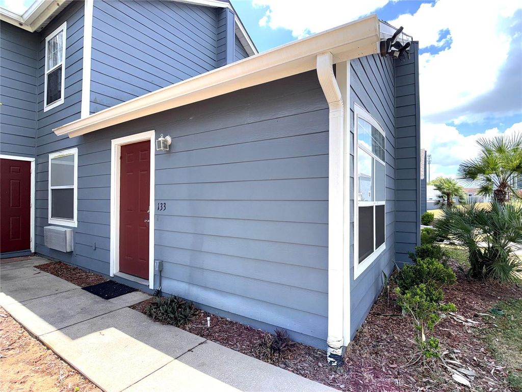 Photo of 133 Mango Drive #Unit A, Davenport, FL 33897 (MLS # O6396565)