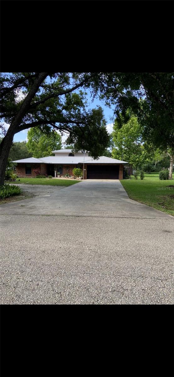Welcome to your own slice of Florida paradise! Nestled on a sprawling 1.25-acre lot in a desirable community located in historic Arcadia, this beautifully maintained 4-bedroom, 3-bathroom pool home offers the perfect blend of country charm and modern comfort. With 2,019 square feet of thoughtfully designed living space, there's plenty of room for both relaxation and entertaining.
Step inside to discover a spacious open floor plan featuring a light-filled living area, kitchen with ample cabinet space, and a split-bedroom layout ideal for privacy. The primary suite offers a peaceful retreat with its own en-suite bath, while the additional bedrooms provide comfort and flexibility for family, guests, or a home office. For peace of mind, a new metal roof was installed in 2024.
Outside, your private oasis awaits! Enjoy sunny days by the screen-enclosed pool, or cast a line in your very own stocked pond—perfect for afternoon fishing right in your backyard. The two storage sheds on the property provide plenty of room for tools, toys, or hobby equipment. Both equipped with water and electricity, with the larger shed having the potential to be a detached bonus living space with just the addition of a bathroom.
Located in a peaceful, established neighborhood with no HOA, yet just a short drive to downtown Arcadia and easy access to nearby shopping, dining, and schools. Even better yet, Florida's beautiful west coast beaches are just under an hour away!