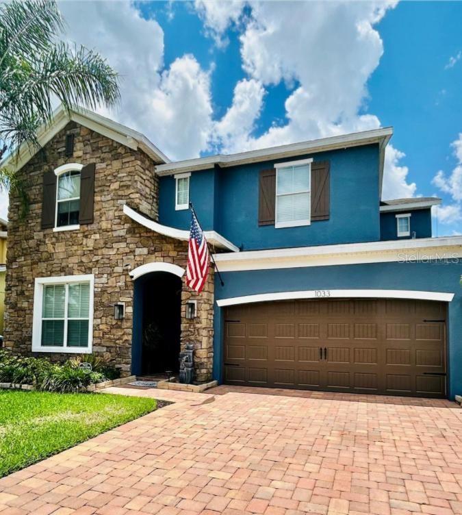 Photo of 1033 Fountain Coin Loop, Orlando, FL 32828 (MLS # O6448513)