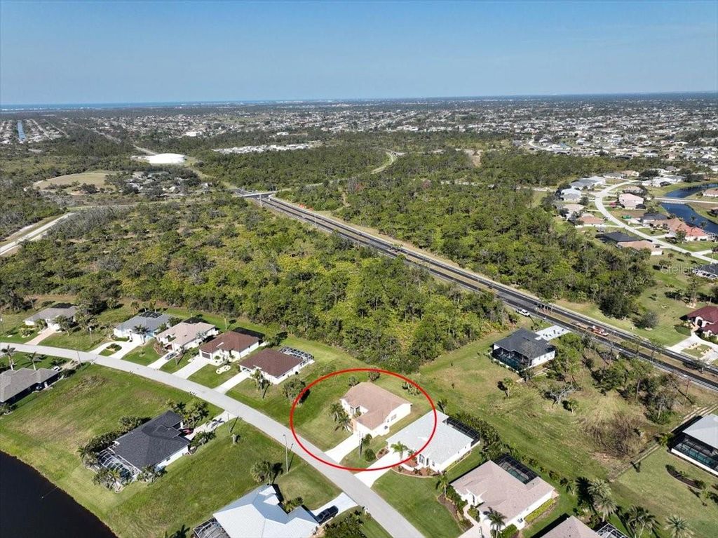 Photo of 127 White Marsh Lane, Rotonda West, FL 33947 (MLS # D6145295)