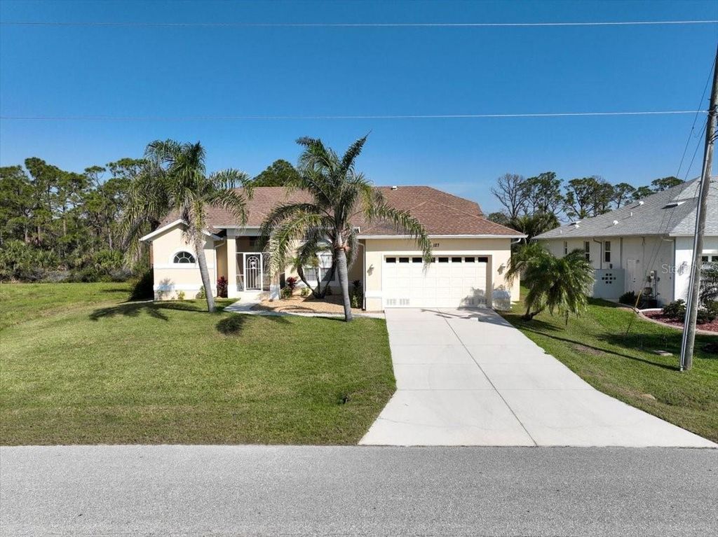 Photo of 127 White Marsh Lane, Rotonda West, FL 33947 (MLS # D6145295)