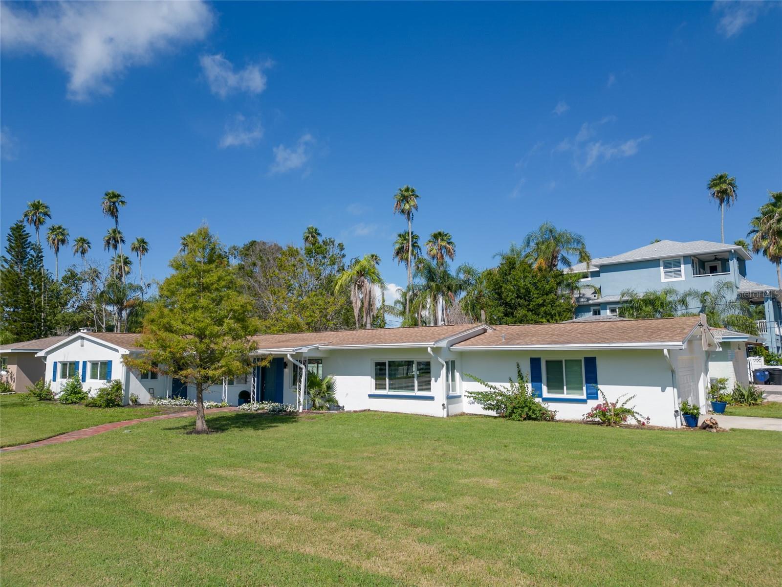 Just "Follow the Red Brick Road" to Your New Home @ 1794 Santa Barbara Drive! Live the Dunedin Lifestyle in this Beautiful Community of Luxury Homes. This Home has Been Tastefully & Fully Updated in 2025! Updates Include: A/C System & Air Ducts, Electrical Panel with Marine-Grade Wiring, Hurricane-Impact Windows & Doors (2024). A Chef's Dream Contemporary Kitchen with Quartz Countertops, SS Appliances & an Oversized Pantry. Both Bathrooms Feature Designer Tile, Updated Vanities and New Toilets. Outside, the Home has a Brand-New French Drainage System, an Outdoor Sump Pump with Electrical Backup, & New Gutters and Downspouts. Oversized Corner Lot is Ready for Your Ideas. Potential for a Pool, Picket Fencing, or Extra Entertaining Space! Just a Few Short Blocks to the Pinellas Trail, Honeymoon Island, and Delightful Downtown Dunedin! This Low-Maintenance Home is Ready to Be Your Forever Home, a Vacation Getaway, or an Investment Opportunity! Dunedin was Just Named the #1 "Most Livable" Beach Town to Retire in by Travel & Leisure Magazine! Stroll 1 Block Away to Nightly Sunsets @ Mira Vista Park. Sunsets That Will Take Your Breath Away! Schedule Your Viewing Today!