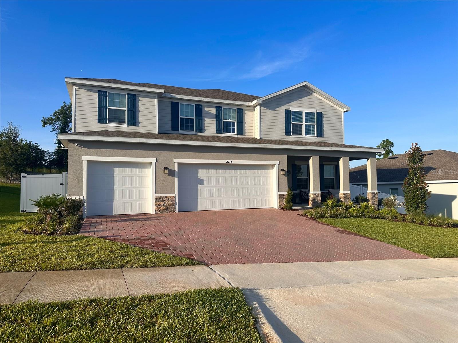 Welcome to 2118 Aibonito Circle, where modern elegance meets unparalleled luxury in the exclusive Bella Terra enclave of Clermont. This meticulously crafted 5-bedroom, 4-bathroom home with a 3-car garage, completed in 2024, is designed to elevate your lifestyle. Nestled on a premium lot with serene views and no rear neighbors, this residence perfectly harmonizes sleek design, custom built features, abundant natural light, and modern finishes.
As you step inside, you'll be greeted by soaring ceilings and an airy, open-concept layout adorned with wide-plank luxury vinyl flooring throughout the main level and Engineered Hardwood Floors in second-floor common areas. The striking designer kitchen stands as the centerpiece, boasting:
- Elegant white shaker cabinetry
- Pristine quartz countertops
- Bold backsplash
- An oversized island with a waterfall-edge seating area
- A complete stainless steel appliance package with double ovens
- A statement coffee/wine bar featuring open shelving and herringbone tile
The walk-in pantry is a masterpiece in itself, featuring floating wood shelves, sleek black lower cabinets, and exquisite designer tile. A custom electric fireplace feature wall anchors the great room, adding warmth and contemporary sophistication.
Upstairs, a spacious loft lounge offers versatility for work, play, or entertainment. The private primary suite is a sanctuary of comfort, featuring a spa-inspired en suite bath and 2 expansive walk-in closet. Generously sized secondary bedrooms are enhanced with custom closet systems throughout.
Outdoor living is equally impressive, featuring:
- An oversized covered patio, pre-wired for a full outdoor kitchen
- White vinyl privacy fencing
- A custom fire pit for enchanting evenings
- Raised garden beds, ideal for cultivating organic herbs or florals
- A peaceful setting with no rear neighbors, offering only lush greenery and open skies
?? Discover Unmatched Convenience:
- Minutes from Downtown Clermont’s Waterfront District, offering lakeside dining, local breweries, and weekend markets
- Just 20 minutes to Downtown Winter Garden
- Only 30 minutes to Disney, Downtown Orlando, and Orlando International Airport
- Convenient access to US-27, SR-50, and Florida’s Turnpike
- Zoned for top-rated schools and in close proximity to Lake Louisa State Park, healthcare facilities, and major retail hubs
This is more than just a home—it's a lifestyle. Every detail has been thoughtfully curated to deliver modern luxury, privacy, and everyday functionality. If you're searching for a home that exceeds new construction, with every upgrade already in place, 2118 Aibonito Circle is your perfect match.
