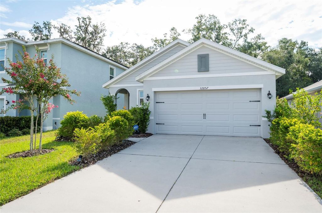 Photo of 32857 Brooks Hawk Lane, Wesley Chapel, FL 33543 (MLS # TB8424076)