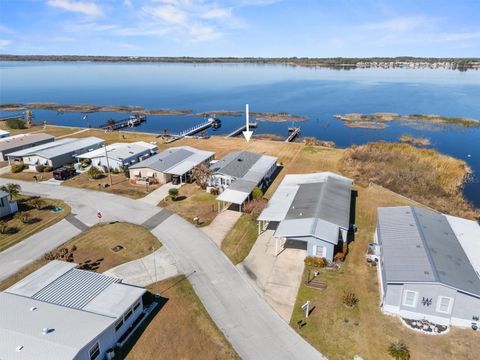 Photo of 6825 S Lake Henry Drive NE, Winter Haven, FL 33881 (MLS # S5143698)