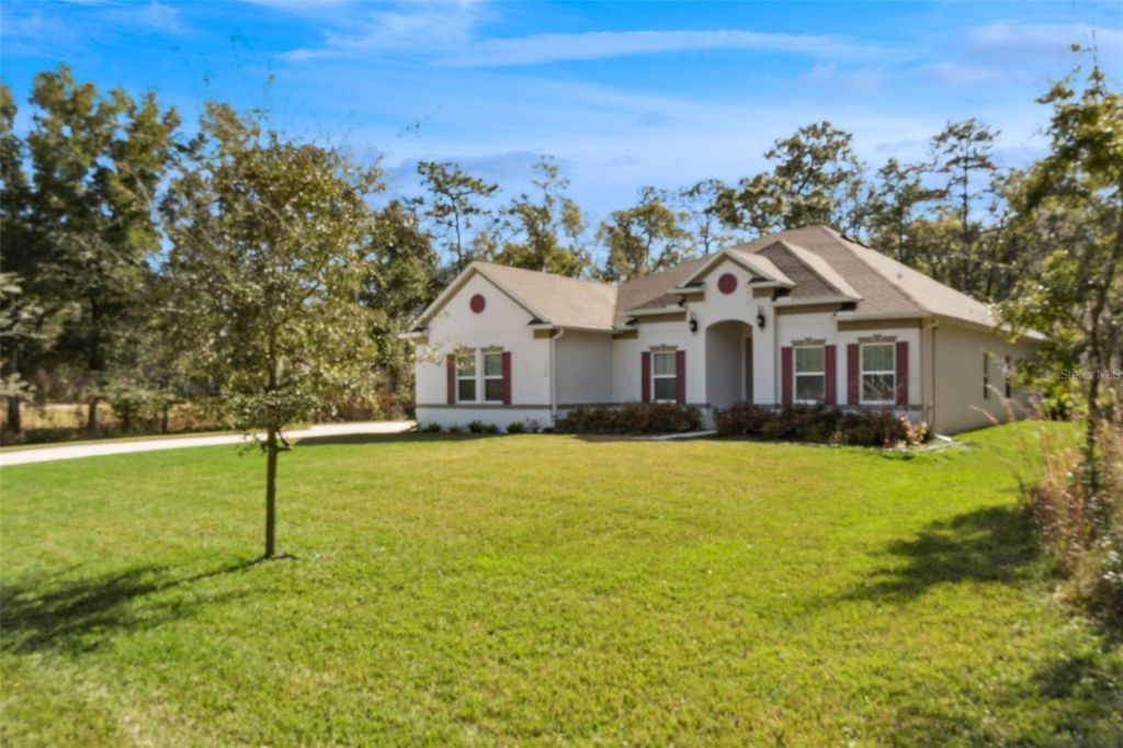 Photo of 1710 Boxborough Drive, Deland, FL 32720 (MLS # O6375967)