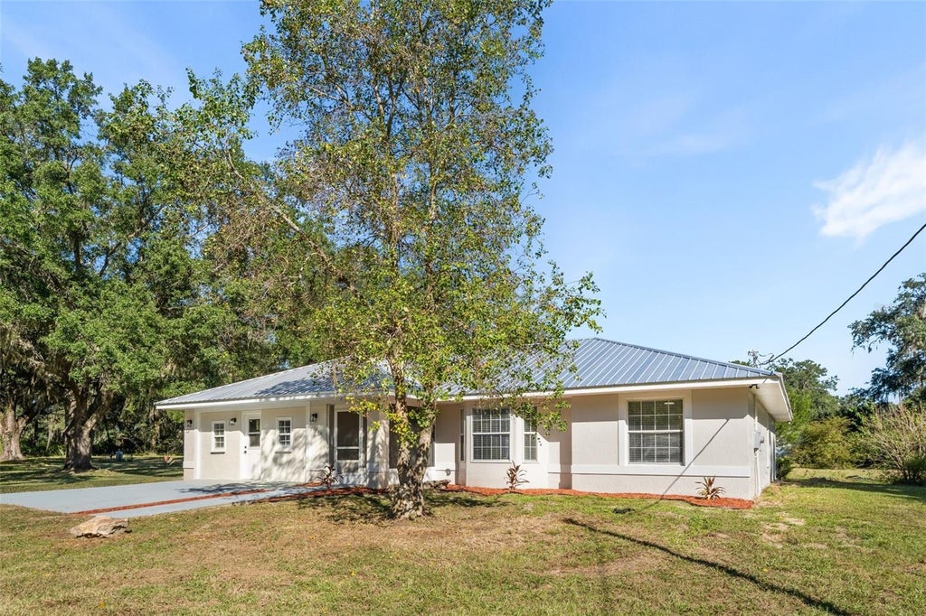 Photo of 7740 NW 145th Avenue Road, Morriston, FL 32668 (MLS # OM734781)