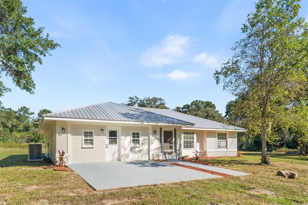 Photo of 7740 NW 145th Avenue Road, Morriston, FL 32668 (MLS # OM734781)