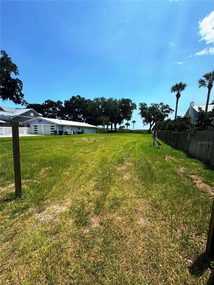 Photo of 622 N Riverside Drive, New Smyrna Beach, FL 32168 (MLS # O6420440)