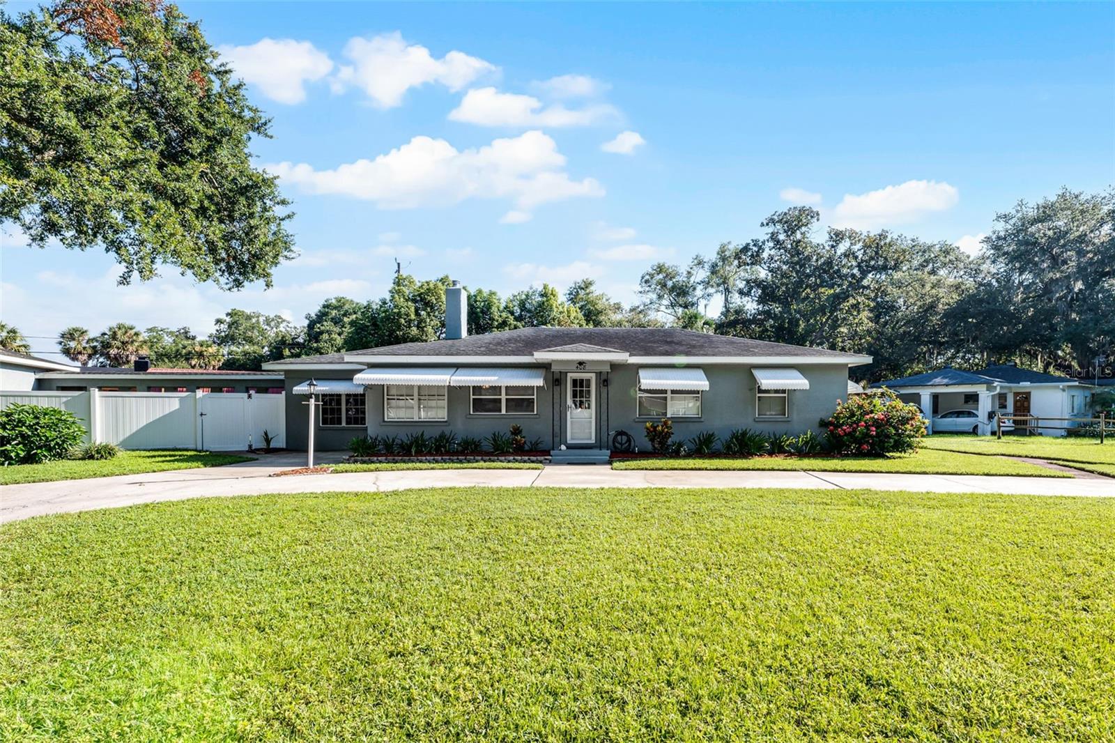 Step into the Garden of Eden in the Middle of Sanford. This meticulously
maintained, well lit, 3 bedroom 2 bath home in the center of town is enveloped by
the mature, fully wooded neighborhood only 1 mile from the SFB airport. The
home interior includes a gas fireplace, city sewer and water, augmented by an
attached water filtration system. Attached storm awnings provide both shade and
protection from the elements. The fully screened rear patio offers quiet serenity
and a green view of the back landscaping. The 0.31 acre lot is fully fenced, and
the in-ground sprinkler system is serviced by a dedicated irrigation well. The
detached high-ceilinged, oversized 2 car garage has space and setup for a
workshop or outdoor office. The sellers are offering a home warranty for the
owners peace of mind. The home needs to be seen to be appreciated. Make your
showing appointment today.