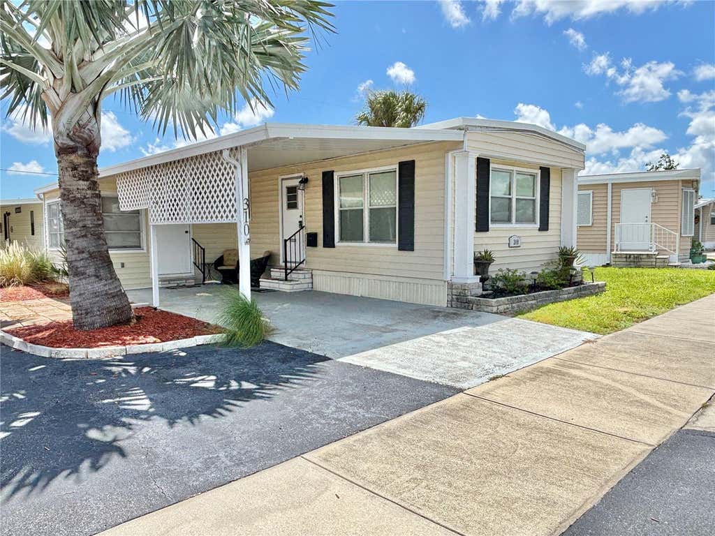 Photo of 310 Mount Piney Avenue NE #266, St Petersburg, FL 33702 (MLS # TB8541506)