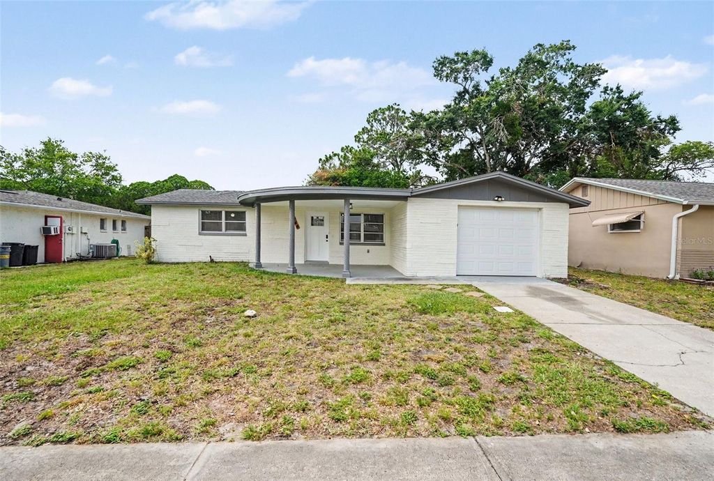 Photo of 6244 6th Avenue, New Port Richey, FL 34653 (MLS # O6415524)