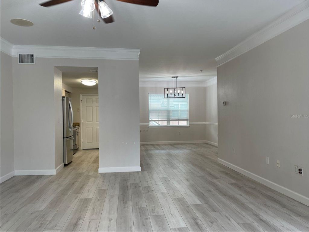 Photo of 6673 Time Square Avenue #102, Orlando, FL 32835 (MLS # O6405721)