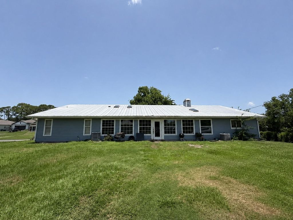 Photo of 1292 Valleybrook Road SE, Palm Bay, FL 32909 (MLS # O6427333)
