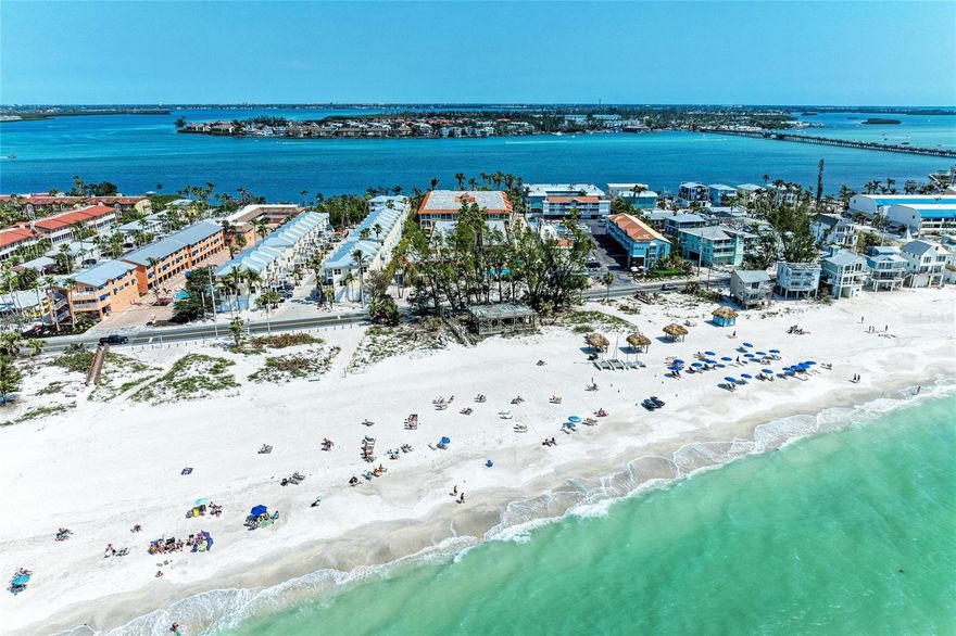 Looking for a beach getaway on stunning Anna Maria Island with proven income. Investment opportunity averages $70K annual income over past 3 years. Like its namesake Tortuga has returned upon the shores of the glorious beach. A Palm Court South second floor condo comprising adjoining Studio & Hotel Room. Layout affords owner dual income. Studio offers full kitchen which is perfect for an extended stay. Hotel Room is perfect for that quick day trip to the island. Open up connecting door for a spacious suite. Relax on front porch overlooking lush tropically landscaped courtyard. Beachy cottage furnishings and decor brightens up the room. Features Mexican tile floors, instahot water heater, built-in shelving, crown molding and large walk in showers. Ideally situated on Sarasota Bay. Tortuga's pristine & private white-sand beach lies along the turquoise waters of the Gulf of Mexico with amazing sunsets. An Award-Winning Beach-to-Bay resort with two heated swimming pools. Cast a line off the fishing pier while enjoying the sunrise. Laundry facilities on site. Daily boat dockage rental possible thru front office. Just a short stroll away lies Historic Bridge Street in Bradenton Beach with numerous boutique shops and restaurants. Or catch the free island wide trolley right outside the driveway and explore the individual styles of Holmes Beach and Anna Maria. Tortuga Inn is pet friendly, too! Flexible nightly, weekly & long-term rental policy is maximized with professional fully turnkey operational on-site management if you choose to utilize. Repeat & Referral guests provide proven positive cash flow -- above all operating costs.