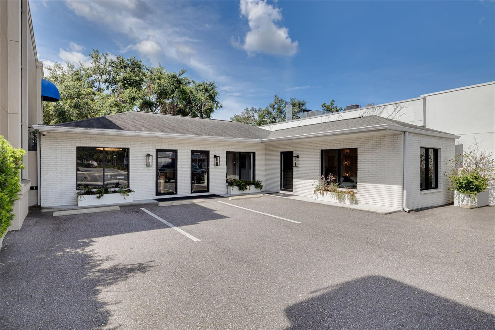 Prime location Westshore location FOR LEASE along the highly visible thoroughfare of W. Kennedy Blvd. in South Tampa. This 1,545 SF space is perfect for any commercial business—office or retail. Former interior designer showroom with high-end interior finishes. Features include two large areas for collaboration or showroom--a clear-span structure providing for a variety of layouts. Features include marble flooring, designer wall coverings, two private bathrooms and a kitchenette area. Plenty of parking in front and in rear of building and building signage for high visibility. In the center of the Westshore Business District, close to Westshore Plaza, I-275, Tampa International Airport, shopping and restaurants.