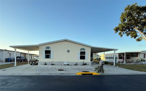 Photo of 209 N Saint Thomas Circle, Apollo Beach, FL 33572 (MLS # TB8444413)