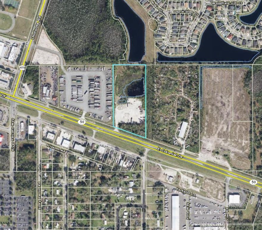 We are pleased to present this 7.88 Aces Industrial site FOR SALE! 

The current owner/business is generating $20,000-$30,000/month, has approximately 60 vehicles parking on his property and they pay by Zelle or Cash app - There are operational cameras on the property for security, the owner has been told it should be easy to convert the agricultural zoning portion in the back to the same zoning C3 if you go through the process, potential to clear all the trees in the front as long as you put up a wall and got proper permitting. Current ownership has a general liability policy at $2 million and cost approx. $1500/year.  
There is approximately 2.5 to 3 acres of concrete on the ground from the previous tarmac cement factory. The owner exclusively leases 10 parking spaces to the truck parking club and they pay $20 daily or $380 a month and then they up-charge it to $25/day through their membership. You can fill in the pond, but it would require mitigation payment to fill in the pond, even though it is man-made from Tarmax years ago.

The owner has a clean report from biotech that was done just a few years ago