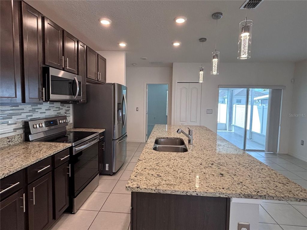 Photo of 157 Villavista Court, Davenport, FL 33896 (MLS # R4910722)