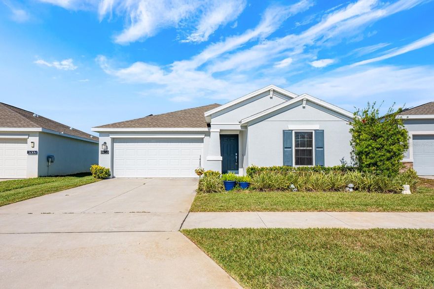 **Ask about a lender provided RATE BUY-DOWN CREDIT on this home!**Discover refined Florida living in this IMPECCABLY MAINTAINED 3-bedroom, 2-bath single-story residence in the highly sought-after Trinity Lakes community of Groveland. Built in 2021, this home blends MODERN SOPHISTICATION with thoughtful updates, creating a space that feels both luxurious and effortlessly livable. PREMIUM UPGRADES elevate your sense of security and ease—a Ring doorbell, full RING SECURITY SYSTEM, a state-of-the-art HUNTER SMART-IRRIGATION SYSTEM with app-based controls, ALL-NEW SPRINKLER HEADS, and comprehensive HURRICANE PROTECTION including sliding door shutters and impact-resistant mesh screens for all windows. An inviting open-concept layout unites the Living, Dining, and Kitchen areas, all enhanced by elegant WOOD-LOOK TILE FLOORING that carries a sense of warmth and style. The spacious Living room is flooded with natural light and complemented by a SLEEK MODERN CEILING FAN, while the Dining area—perfectly placed near expansive sliders—sets the stage for intimate meals and lively gatherings. At the heart of the home, the SHOWPIECE Kitchen impresses with a grand center island and breakfast bar, polished solid-surface countertops, stainless steel appliances, designer SUBWAY TILE BACKSPLASH, and an expansive walk-in pantry. It’s a culinary haven crafted for both beauty and function. The luxurious Primary Suite offers a peaceful retreat, featuring a generous walk-in closet and a SPA-INSPIRED EN SUITE BATH with dual sinks and a step-in shower. Two additional well-appointed bedrooms share a stylish second full bath, while the DEDICATED LAUNDRY ROOM—complete with washer, dryer, and storage shelving—adds everyday convenience. Sliding doors open to a small outdoor patio overlooking a spacious backyard, offering endless possibilities for relaxation or future enhancements. With a LOW HOA, residents of Trinity Lakes enjoy an exceptional RESORT-STYLE LIFESTYLE, complete with a beautifully appointed community center that includes a large indoor furnished space for activities, gorgeous pool with KIDS' SPLASH ZONE, fitness center, playground, and scenic neighborhood walking trails. Located near US-27, Florida’s Turnpike, SR 50, and DOWNTOWN CLERMONT, you’re minutes from shopping, dining, Lake County’s chain of lakes, boat ramps, parks, and the area's charming local festivals and farmers markets. Don't miss out on this BEAUTIFULLY DESIGNED HOME that brings comfort, sophistication, and modern living together in perfect harmony. Schedule your tour today!