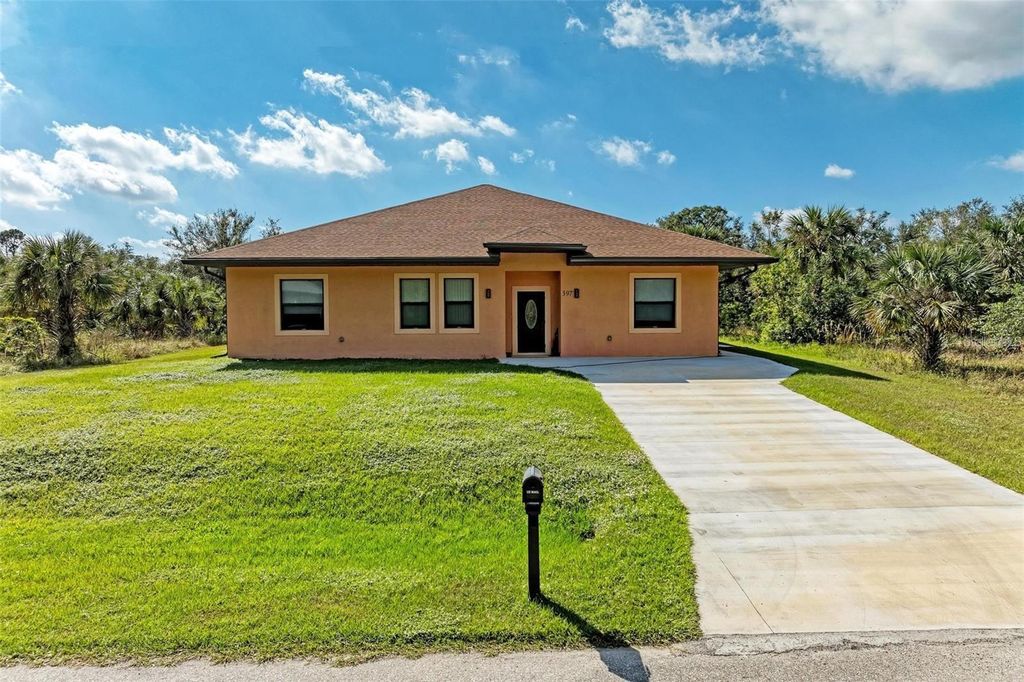 Photo of 397 Doniphan Drive, Port Charlotte, FL 33954 (MLS # A4698233)