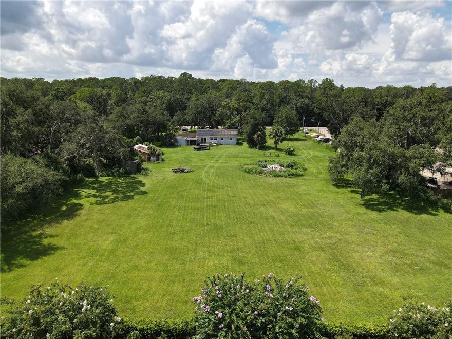 An Ideal Investment Piece in Osceola County. This 2-ACRE property currently features a small residential home but is ZONED COMMERCIAL Tourism (CT), offering a wide range of potential uses. Whether you’re looking to develop a commercial venture, hospitality project, or other tourism-driven business, this land provides flexibility and prime positioning for future growth. Located in a rapidly developing area with increasing demand, the possibilities are extensive.

The property sits directly on Orange Blossom Trail (SR 441), which is planned for a major expansion from two lanes to four lanes, projected between 2030 and 2040. This upcoming infrastructure improvement highlights the area’s continued growth and rising commercial potential. With the surrounding corridor already transitioning toward commercial use, this lot offers a strategic long-term investment opportunity.

Permitted uses include (but are not limited to): Hotels, bed & breakfasts, and campgrounds, Theme parks and entertainment complexes, Big-box retail and food/beverage sales, Daycare or adult care centers, Gas stations and auto leasing, Educational and medical facilities, Indoor gun range, gym/fitness center, and more.