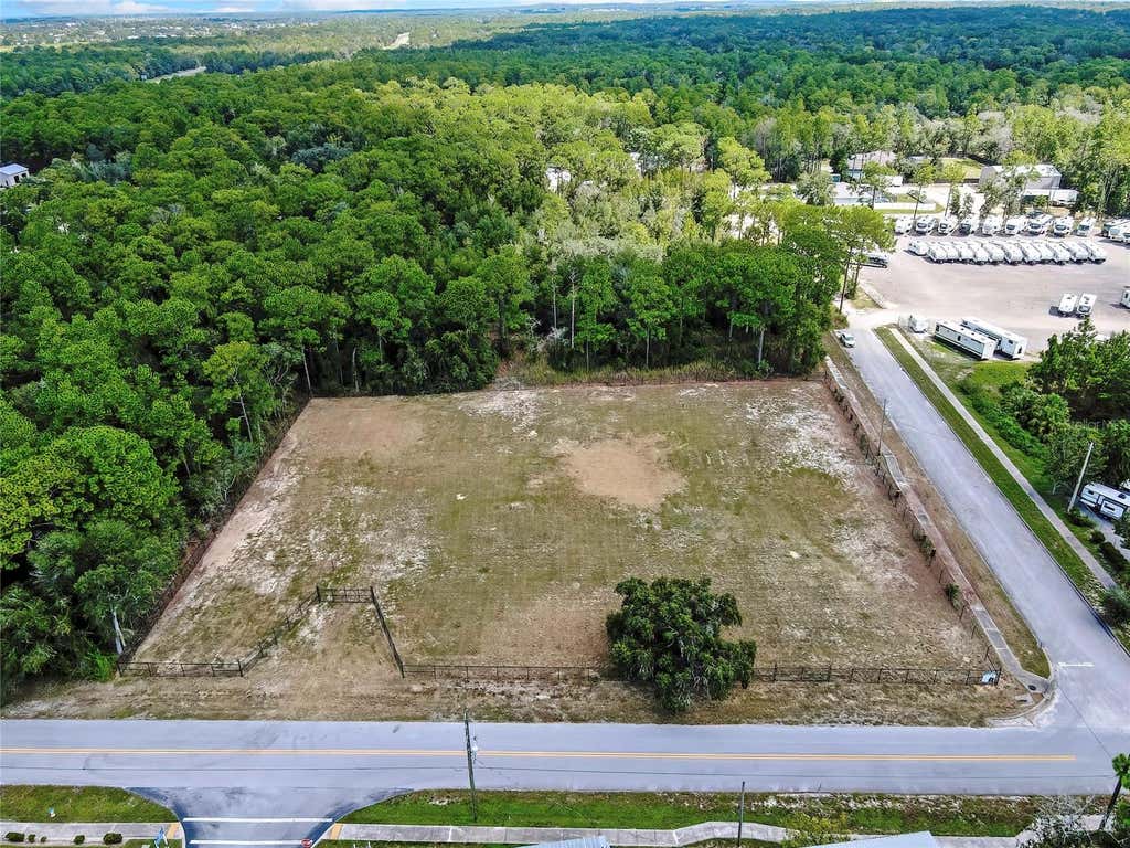 Photo of 15241 Horn Avenue, Brooksville, FL 34613 (MLS # O6434503)