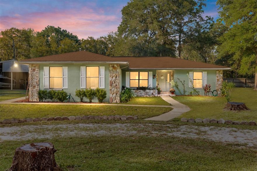 Welcome to your private, peaceful country retreat! This 4-bedroom, 3-bath home offers 2,003 sq ft of living space with a newer roof, A/C, and water heater (al 2020) for peace of mind. Inside, the master and kitchen feature tile flooring, while the other two bedrooms have laminate floors. Ceiling fans are found throughout, adding comfort and efficiency. Enjoy a fully self-contained in-law suite with its own private entrance, central air, and tile flooring throughout—perfect for guests or extended family. The property also includes three outdoor buildings and a shed, ideal for hobbies, storage, or workshops. Sitting on A1-zoned land, this property offers rare flexibility and endless possibilities. Just minutes from Ocala shopping, Dunnellon’s Rainbow River State Parks, riverfront dining, walking & biking trails. Zoned for great schools, this home combines comfort, privacy, and convenience. Don’t miss your chance to own a piece of Rolling Hills—schedule your showing today!