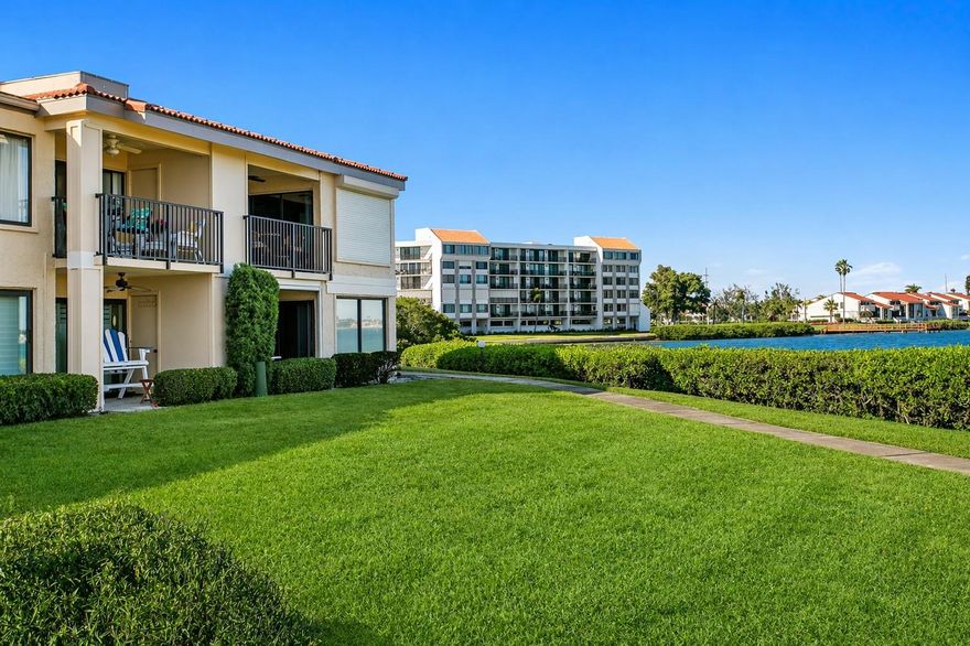 Experience expansive, open water views of Boca Ciega Bay from this beautifully updated second-floor residence in the highly desirable Palma Del Mar community on Isla Del Sol. With a view so wide it feels as though the bay becomes part of your living space, this waterfront condominium delivers a refined, effortless coastal lifestyle.
The open-concept floor plan is designed to maximize both natural light and views, with sweeping water vistas extending across the living room, dining area, and into the primary suite. Large sliding glass doors and picture windows frame the waterfront backdrop, creating a seamless connection between indoor living and the natural beauty beyond.
The kitchen is thoughtfully updated with newer appliances, including a recently installed refrigerator and disposal, offering both functionality and ease for everyday living and casual entertaining. The interior is finished in a relaxed coastal palette, complemented by durable vinyl plank flooring that enhances both style and practicality.
The spacious primary suite serves as a private retreat, highlighted by direct bay views, a redesigned custom walk-in closet, and an updated spa-style bathroom. A split-bedroom layout provides privacy for guests, with a generously sized guest bedroom positioned adjacent to a second updated bath.
Recent improvements provide meaningful value and peace of mind, including a new HVAC system (2026) and new water heater (2026), along with many updated coastal finishes throughout. The residence is offered fully furnished, creating a true move-in-ready or lock-and-leave opportunity.
Step outside to your private veranda with new gemstone finishes - overlooking the bay and the waterfront pool and spa—an ideal setting for morning coffee, evening relaxation, and year-round enjoyment of Florida’s coastal climate. A covered parking space and private storage room located just steps from the front door add everyday convenience.
Palma Del Mar has recently undergone community improvements and offers a resort-style setting with amenities that include a heated waterfront pool and spa, fishing pier, kayak storage, and community gathering spaces, all set within beautifully maintained grounds. Optional membership opportunities are available nearby at the Isla Del Sol Yacht & Country Club for golf, tennis, and social activities.
Ideally located, you are just minutes from the award-winning beaches of Fort De Soto and St. Pete Beach, approximately 15 minutes to downtown St. Petersburg, with its museums, restaurants and parks and with convenient access to I-275 and Tampa International Airport.
Whether used as a primary residence, seasonal retreat, or income-producing rental property, this residence offers a compelling combination of open water views, thoughtful updates, turnkey convenience, and exceptional location.