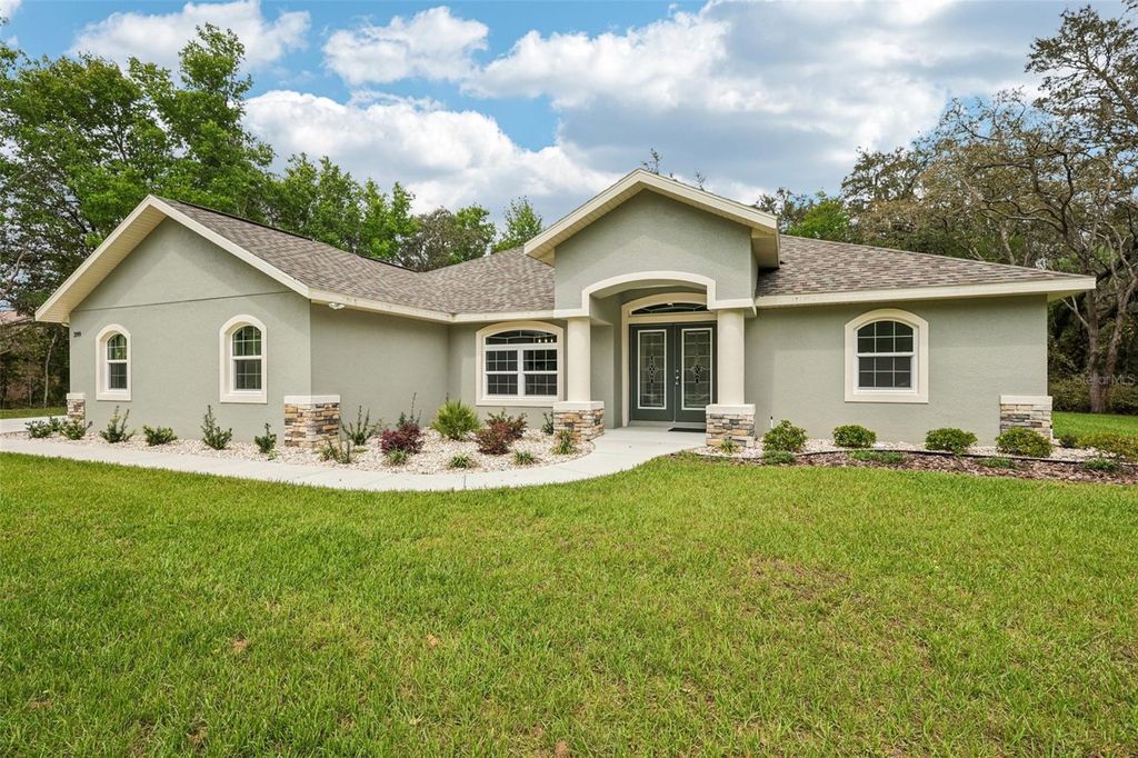 Photo of 399 W Massachusetts Street, Hernando, FL 34442 (MLS # TB8490333)
