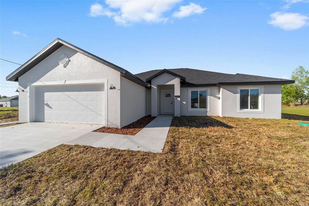 Photo of 154 Juniper Run, Ocala, FL 34480 (MLS # OM721238)