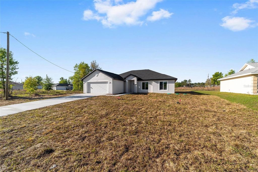 Photo of 154 Juniper Run, Ocala, FL 34480 (MLS # OM721238)