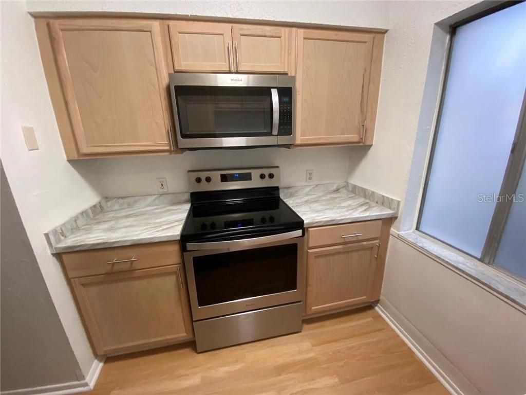 Photo of 7508 Presley Place #100, Tampa, FL 33617 (MLS # TB8488062)