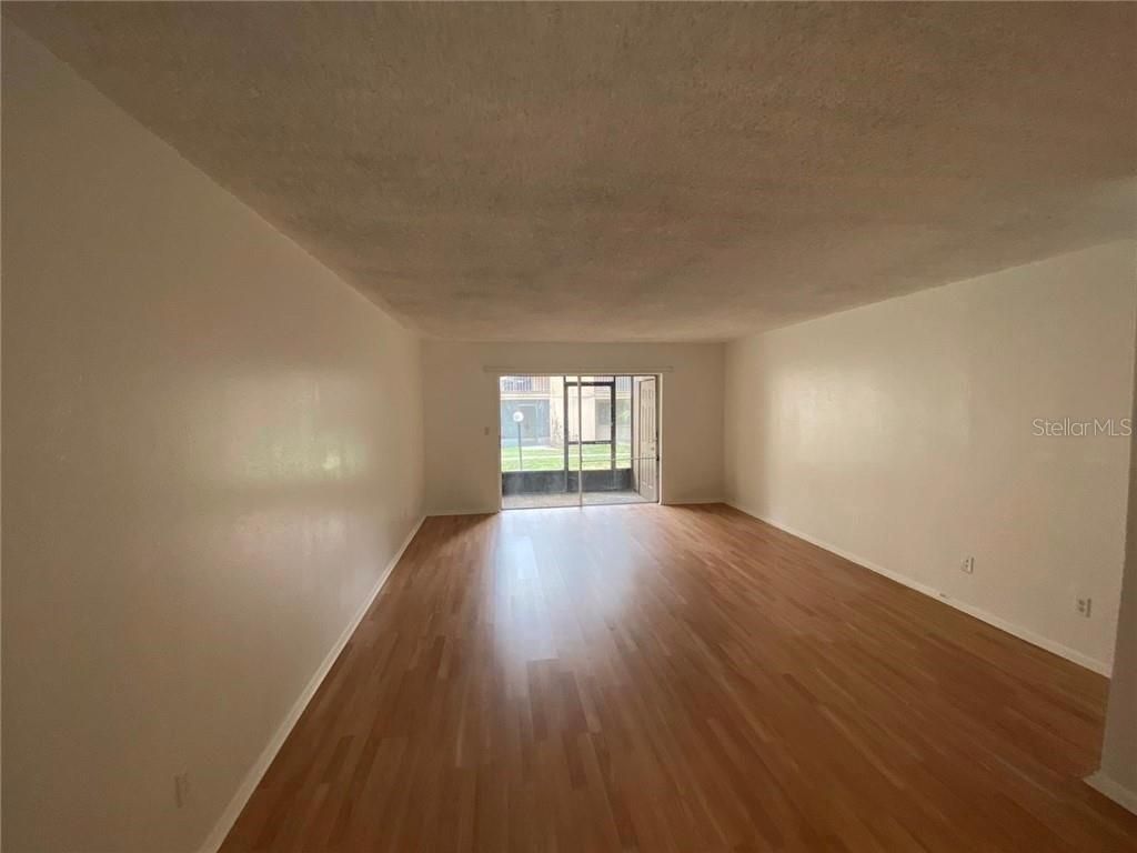 Photo of 7508 Presley Place #100, Tampa, FL 33617 (MLS # TB8488062)