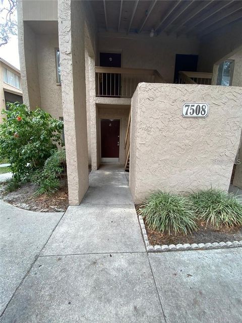 Photo of 7508 Presley Place #100, Tampa, FL 33617 (MLS # TB8488062)